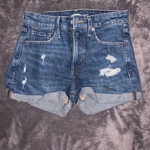 Distressed blue Jean shorts